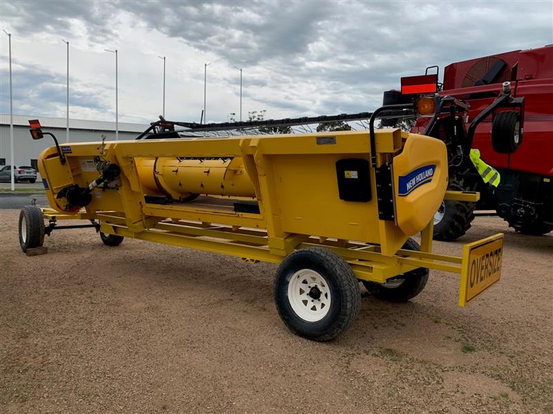 Photo 2. New Holland 790C Pick Up Front