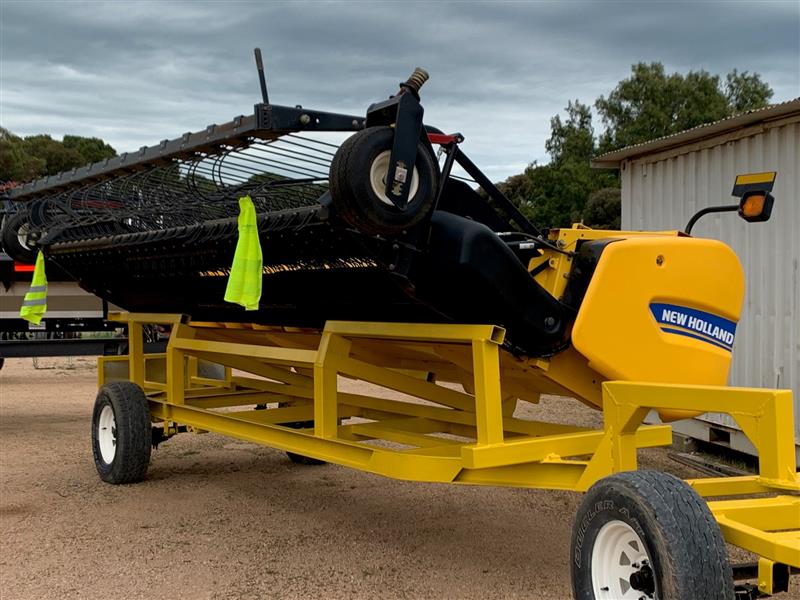 Photo 5. New Holland 790C Pick Up Front