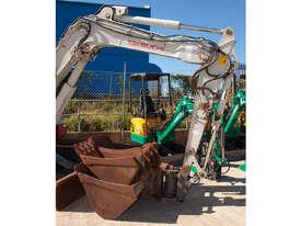 Photo 3. Takeuchi TB280FR Compact Hydraulic Excavator with Tilting Quick Hitch